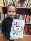 ''Черная книга исчезнувших видов животных''. Художница Вероника показывает свой рисунок с птицей Додо. Библиотека им. В. Дубинина. 9 октября 2024 года